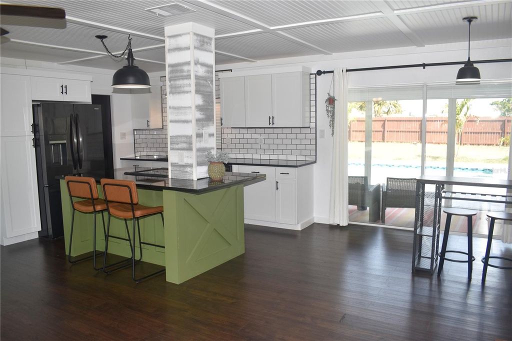 Photo of 821 Silver Springs Terrace NW, Port Charlotte, FL 33948 (MLS # O6308366)