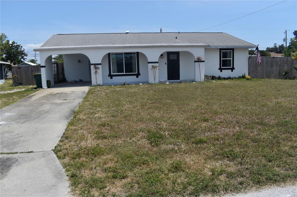 Photo of 821 Silver Springs Terrace NW, Port Charlotte, FL 33948 (MLS # O6308366)