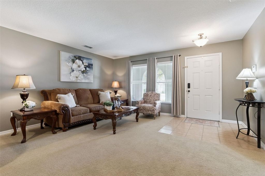 Photo of 2636 Grassmoor Loop, Apopka, FL 32712 (MLS # O6400135)