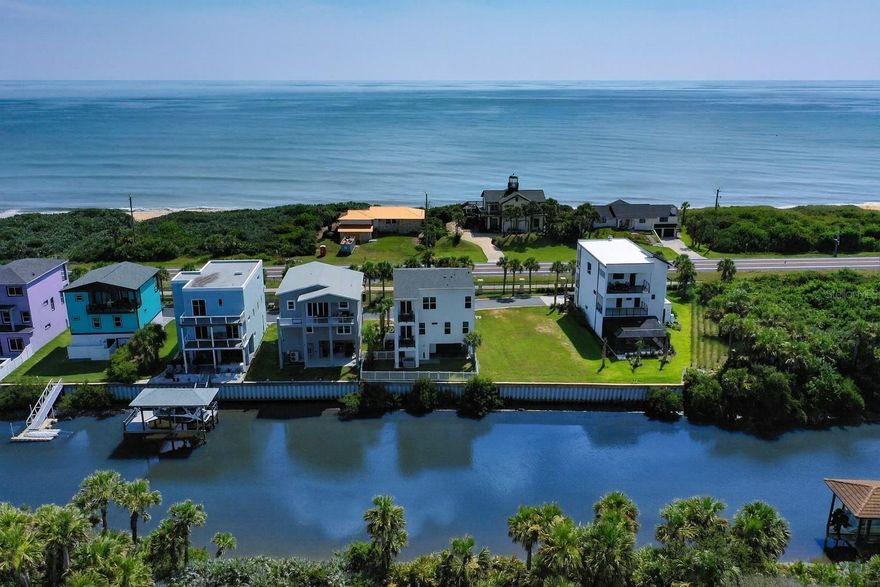 Welcome to 3538 North Ocean Shore Boulevard, a rare opportunity in Flagler County offering both deeded beach access and quick access to the Intracoastal Waterway. This beautiful three-story coastal residence, built in 2023 and offered fully furnished, blends modern comfort with the best of Florida’s waterfront lifestyle.

This move-in-ready home includes five bedrooms, four and a half bathrooms, and approximately 3,000 square feet of thoughtfully designed living space. The open-concept third floor features a well-appointed kitchen with modern appliances, a dining area, and a bright, airy living room with large windows that showcase mesmerizing ocean views. The third floor is also home to the private primary suite, complete with a soaking tub, separate shower, and dual vanities.

A private elevator provides access to all levels, making everyday living and entertaining seamless. The second floor offers three guest bedrooms, a dedicated children’s room, and a versatile flex space perfect for reading, watching a movie, or simply enjoying the views in peace.

The first floor includes a game room, a full bathroom, and a convenient kitchenette—ideal for hosting, refreshments, or rinsing off after a day at the beach. A two car garage with convenient pass-through for beach and water toys completes the layout, designed for easy access to the backyard, the water, and all your recreational needs.

Step outside to experience the serenity of Fox Cut, where you can cast a line from your own backyard with ample space to add a private dock. Just across the street, take advantage of deeded beach access for effortless walks to the sandy shoreline.

Located near private clubs with resort-style amenities, championship golf courses, a full-service marina, and scenic nature trails, this home offers a lifestyle that is both elevated and inviting. Whether you’re seeking rest or recreation, there’s something here for everyone.

With expansive water views from nearly every room, this property invites you to slow down, savor the moment, and welcome family and friends to stay awhile.

Schedule your private tour today and experience everything this exceptional coastal property has to offer.