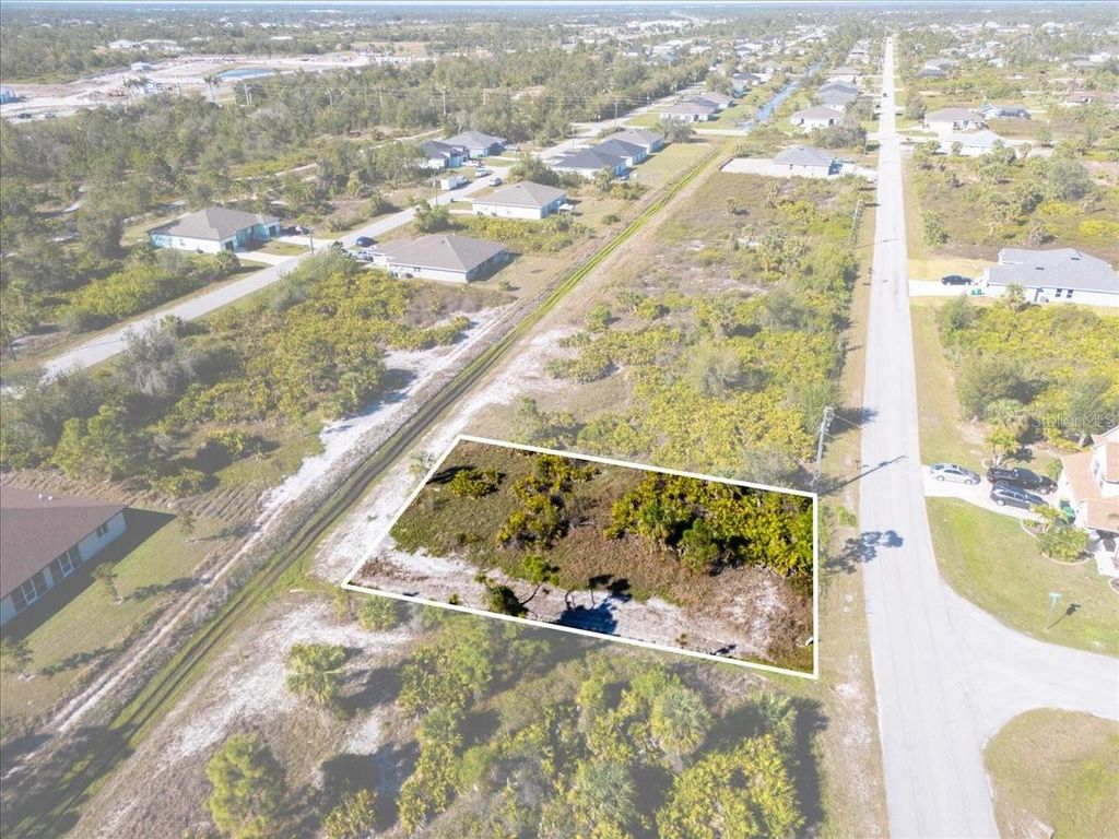 Photo of 9235 Waldrep Street, Port Charlotte, FL 33981 (MLS # C7506879)