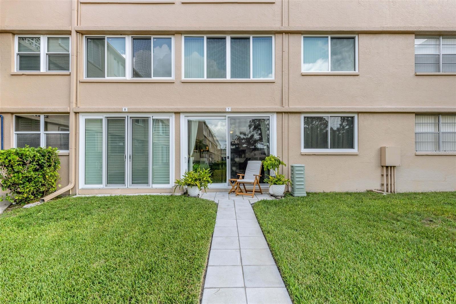 Discover your perfect retreat in this well-maintained 55+ condo, ideally suited for comfortable, low-maintenance living. Nestled in a peaceful community, this unit has not been flooded, providing peace of mind in any weather. Recent upgrades make it truly turnkey: a new AC unit and water heater installed in 2023, along with hurricane-proof windows added the same year for enhanced safety and energy efficiency. Inside, you'll love the versatile space featuring a Murphy bed that maximizes functionality without sacrificing style – perfect for guests or a home office setup. The interior is enhanced by gentle lighting, creating a warm and inviting atmosphere throughout. The community shines with resort-like amenities designed for an active lifestyle: relax by the heated pool, challenge friends to a game of shuffleboard, or gather in the welcoming clubhouse for social events and activities. Flexible options to suit your needs – this condo can be sold partially furnished or unfurnished, allowing you to personalize it just the way you want. Priced to sell and ready for immediate occupancy, this gem won't last long! Contact us today to schedule a viewing and start enjoying the carefree 55+ lifestyle you've been dreaming of.