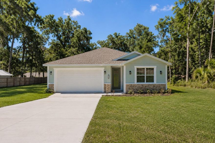 One or more photo(s) has been virtually staged. Brand new and move-in ready, this beautifully designed 4-bedroom, 3-bathroom home features two private bedroom suites, each with its own bathroom, perfect for guests or multigenerational living. Situated on an oversized 0.32-acre lot with no HOA and potential USDA financing for qualified buyers, which may allow eligible buyers to purchase with 0% down payment, this home offers the perfect combination of comfort, functionality, and modern design.

Inside, you’ll find high ceilings with crown molding, ceramic tile throughout the main living areas, and a bright open-concept layout ideal for everyday living and entertaining. The kitchen features granite countertops, backsplash, stainless steel appliances, soft-close cabinetry, ample counter space, and a large island overlooking the living and dining areas. Blinds throughout the home add convenience and privacy from day one.

The home also includes a covered back patio, spacious 2-car garage, and the convenience of well and septic. The builder is offering $5,000 toward buyer closing costs or a rate buy-down, along with a 1-year builder warranty and 10-year structural warranty for added peace of mind. Conveniently located near Belleview, South Ocala, Lake Weir, The Villages, shopping, dining, outdoor recreation, and I-75.
