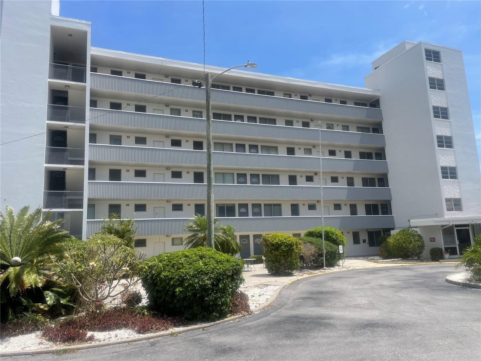 Gorgeous views from this 5th floor, 1 bed 1 bath unit overlooking the Clearwater Golf and Country Club. This co-op condo is a quick three miles from Clearwater Beach voted Best Beach in America. The community 55+ is well maintained with designated covered parking as well as guest parking. Open floor plan with spacious living, kitchen & dining room, laminate flooring throughout, The community offers a lovely open green space, BBQ and picnic area, laundry facility (no charge for residents) and a private storage unit. Directly next to Clearwater Golf & Country Club and walking distance to the public library, bus line, parks, and a fitness trail for those who love to bike ride. Popular natural food market & cafe minutes away. Grow your own herb and vegetables garden at Clearwater Community Gardens. Enjoy the Florida lifestyle close to an abundance of dining and activities including Clearwater Beach, Honeymoon Island, and Caladesi Islands. There are a multitude of annual events including boat shows, Jazz Fest, a seafood festival, professional sandcastle building competitions, and much more at Clearwater’s Coachman Park. So much to do in such close proximity to this great unit, call to schedule your showing today!