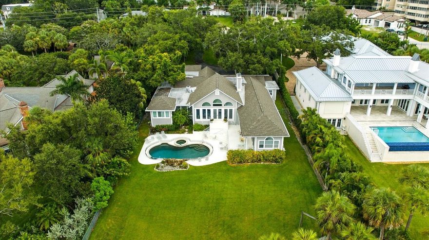 "Sunset Sereno" A Sanctuary by the Sea. Welcome to 228 Bluff View Drive — A waterfront dream in Belleair Bluffs. Nestled in the coveted, private community of Belleair Bluffs, this nearly one-acre estate offers an unparalleled opportunity to embrace luxury waterfront living. Sitting directly on the Intracoastal Waterway and framed by lush, mature landscaping, this stunning property boasts both privacy and breathtaking water views. Located in a non-evacuation area and an X Flood Zone, the home sits a generous 22 feet above sea level, offering peace of mind even during the most powerful storms. Over the years, this property has been untouched by hurricanes, making it a rare and secure investment in the heart of Pinellas County. With palm trees lining the rear of the estate, your daily views are a picturesque mix of serene waters and tropical foliage with the most breathtaking sunsets, creating the perfect backdrop for a tranquil lifestyle. Just minutes from top-rated beaches, surrounded by top-tier dining and shopping where lifestyle, convenience and charm collide. Whether you’re looking to build your dream home or renovate an existing gem, the possibilities for luxury living are endless.