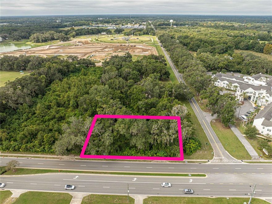This exceptional .78-acre parcel, just steps from The Villages’ Brownwood Town Center, offers one of the last remaining development opportunities on Powell Road. Zoned CMU (Commercial Mixed Use), the property is ideally positioned in one of Florida’s fastest-growing regions.Located adjacent to Millennium Park in the City of Wildwood, the site provides direct access to key community amenities while benefiting from the continued expansion of The Villages—the nation’s largest and fastest-growing single-site development.Adding to its appeal, this property is among the few remaining sites with sewer capacity reservations, enhancing its value and readiness for development.Don’t miss this rare opportunity—contact us today for more information.