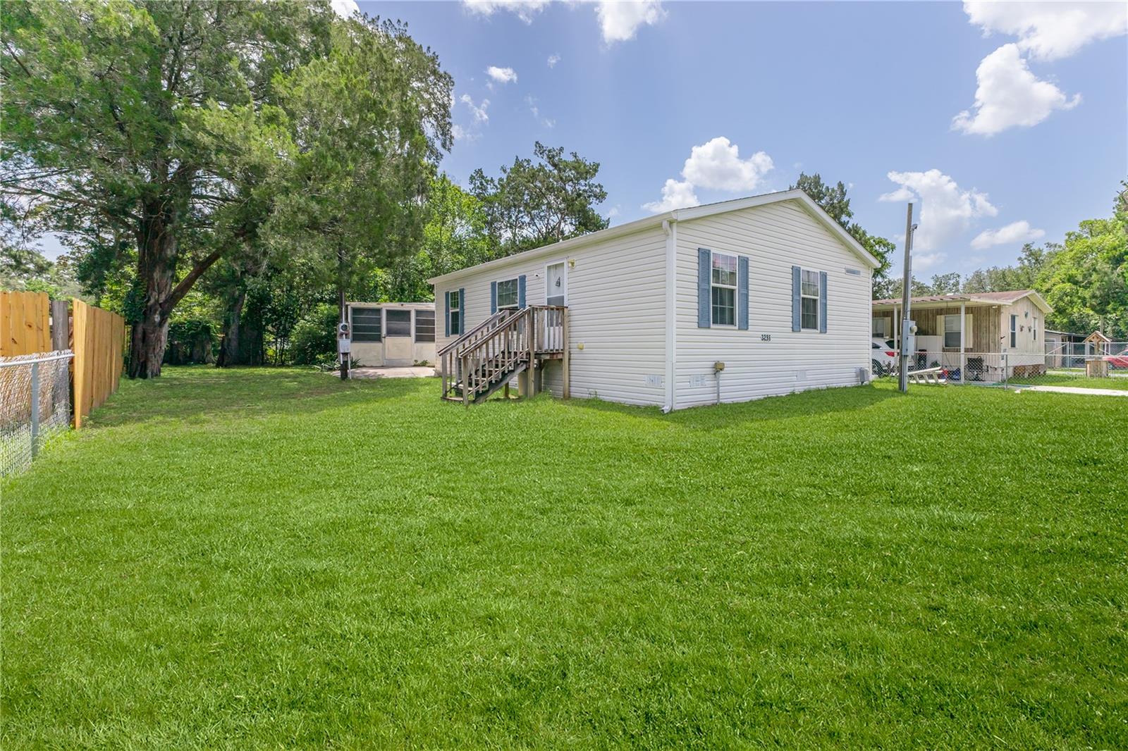Affordable Florida living starts here with this well-maintained 2-bedroom, 2-bathroom manufactured home located in a quiet, friendly neighborhood with no HOA fees or restrictions. Whether you're looking for a full-time home, a seasonal retreat, or an investment property, this move-in ready residence offers great value and flexibility.
Inside, you’ll find a comfortable open layout with vaulted ceilings, a combined living and dining area, and a functional kitchen. The washer and dryer are included, and the home is clean and ready for your personal touch. There’s also a detached screened-in bonus area, perfect for extra storage, plus a partially chain-link fenced backyard for added convenience.
The location is ideal for those who enjoy the outdoors, with easy access to local fishing spots, the Tarpon Springs sponge docks, scalloping areas, bike trails, kayaking, and more. Golf courses, shopping, dining, and medical offices are all nearby, with quick access to Hwy 50 and US 19 for commuting or day trips to Tampa and Saint Pete airports, and Central Florida’s theme parks.
A solid option at a great price — this property is a smart choice for buyers looking for comfort, location, and value. Ask about renovation loan options if you’d like to customize to your taste. This property would be perfect for either retiree snowbirds or first-time buyers.
Schedule your showing today!