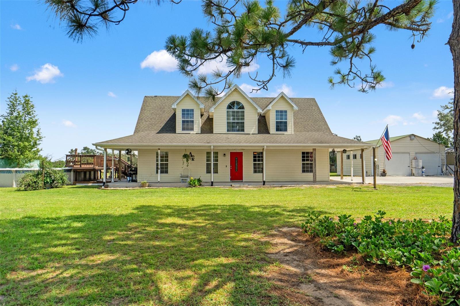 Welcome to your private retreat at 28297 Wild Rose Lane in Brooksville, FL. This charming two-story home is nestled on 2.5 beautifully manicured and fully fenced acres, offering the perfect blend of rural tranquility and modern comfort. Featuring 3 bedrooms and 2.5 bathrooms, this residence includes jetted tubs in both full baths for a relaxing spa-like experience.
Built in 2007, the home offers a spacious open-concept living and dining area with durable laminate flooring throughout the main floor. The primary suite is conveniently located downstairs, while two additional bedrooms and a full bath are upstairs, providing a practical split-bedroom layout. A large laundry room and half bath add to the functionality of the home.
Outside, you'll find ample space for both leisure and storage. A separate 4-car garage is ideal for car enthusiasts, hobbyists, or those in need of a workshop. An additional container offers even more storage options. Enjoy summer days in the above-ground pool or relax on the expansive wraparound porch with views of the sprawling, tree-lined yard.
Located just minutes from shopping, dining, schools, and healthcare in Brooksville, with easy access to I-75 for commuting to Tampa or Ocala, this property combines the best of country living with modern convenience. Whether you're looking for space to spread out, raise animals, garden, or simply enjoy privacy, this home has it all.
Don’t miss your opportunity to own this unique property that offers peaceful surroundings, versatile outdoor space, and functional interior design—all without HOA restrictions or flood insurance requirements. Schedule your private showing today and experience the possibilities that await at 28297 Wild Rose Lane!