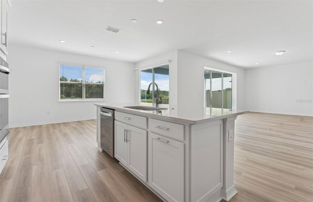 Photo of 1249 Lakeridge Way, Lake Alfred, FL 33850 (MLS # TB8434474)