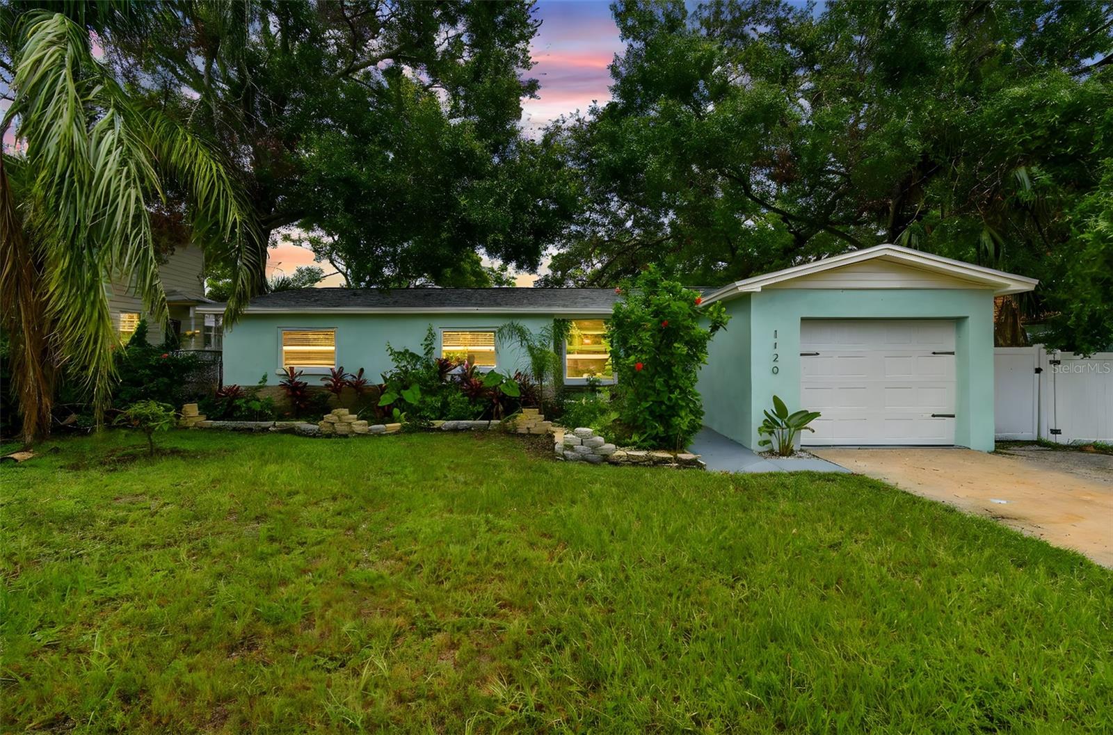 In the heart of Gulfport, this updated four-bedroom, three-and-a-half-bath residence offers a seamless blend of modern comfort and thoughtful design. Spanning 1,738 square feet, this block home was completely remodeled in 2023 to include all new electrical and plumbing, wood-like plank laminate flooring, a new kitchen with eat-in island/bar, a built-in pantry, built-in oven, built -in cooktop and granite countertops, renovated baths, and a new roof. The living room is centered around a fireplace for inviting gatherings. The primary bedroom includes an en-suite bath and direct access to the fenced backyard. A second bedroom has its en-suite bath, great for family or guests! Outdoor highlights include alley access via the fence gate and storage shed. No flood insurance required and in proximity to Gulfport’s vibrant art district, dining and waterfront, this home presents a rare opportunity for refined Florida living. Hurricane impact windows. Roof-2023 and HVAC-2019.