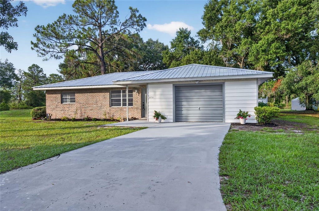 Photo of 2751 Park Avenue, Indian Lake Estates, FL 33855 (MLS # TB8483256)
