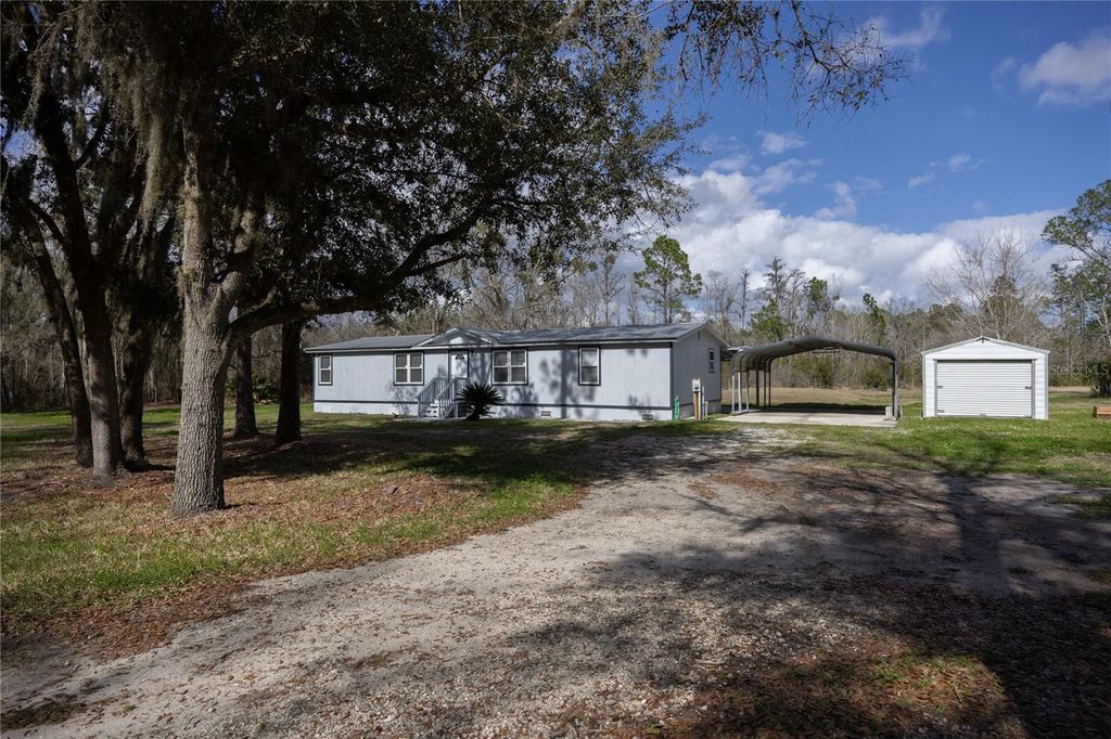 Photo of 122 Cypress Drive, Palatka, FL 32177 (MLS # GC538059)