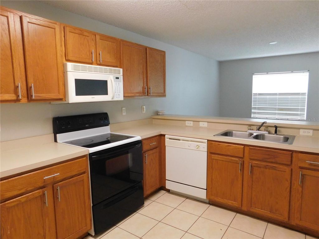 Photo of 8517 Edgewater Place Boulevard, Tampa, FL 33615 (MLS # TB8445976)