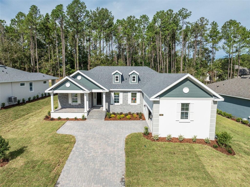 Photo of 3926 Southern Valley Loop, Brooksville, FL 34601 (MLS # TB8369271)