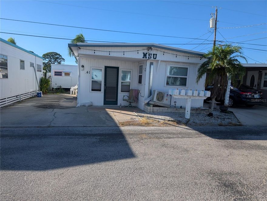 Well sought after 55+ co-op restricted mobile home park community, 1 bedroom and 1 bath home, location, location, Waterfront park,
community inground heated pool, shuffleboard, pickleball, bocce ball, exercise room with equipment. Marina is an extra charge for the slip.
Sunset views from the sea wall. The fee includes water and sewer, lawn cutting, and all the amenities except the marina. This is a hurricane-damaged home that needs interior work—selling AS-IS. New windows, 5 years old, new roof, 5 years old.