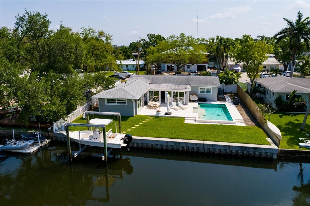 Photo of 9294 Treasure Lane NE, St Petersburg, FL 33702 (MLS # TB8492524)