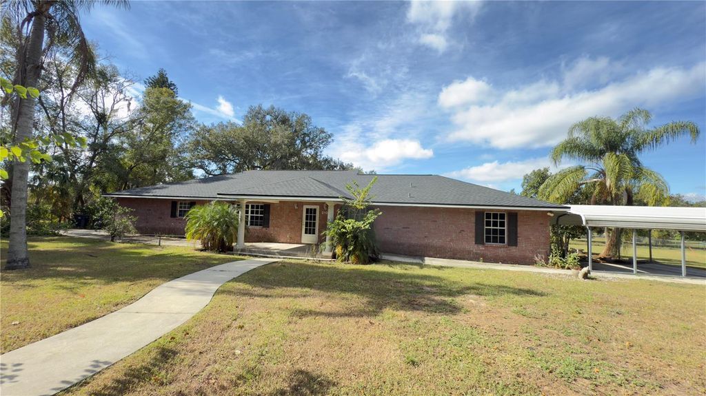 Photo of 2105 Vickery Lane, Dover, FL 33527 (MLS # TB8452724)