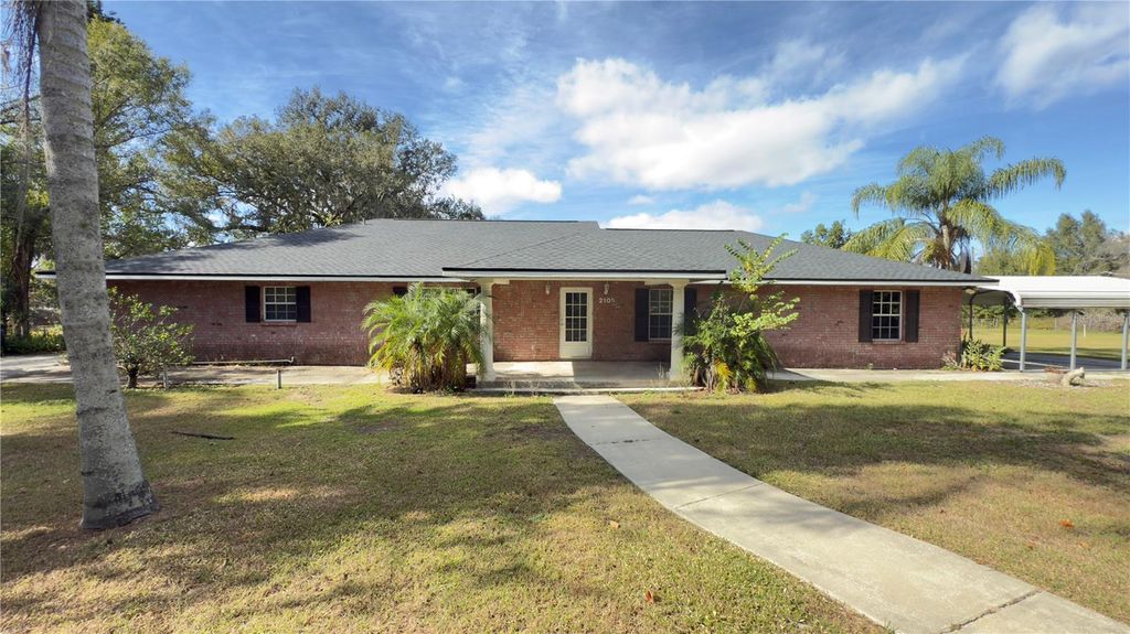 Photo of 2105 Vickery Lane, Dover, FL 33527 (MLS # TB8452724)