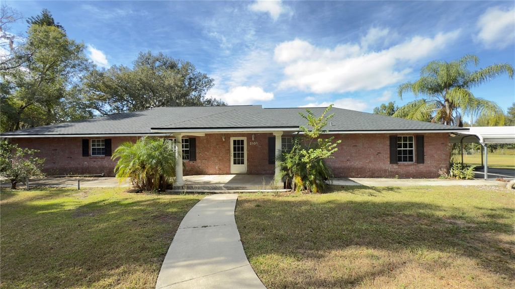 Photo of 2105 Vickery Lane, Dover, FL 33527 (MLS # TB8452724)