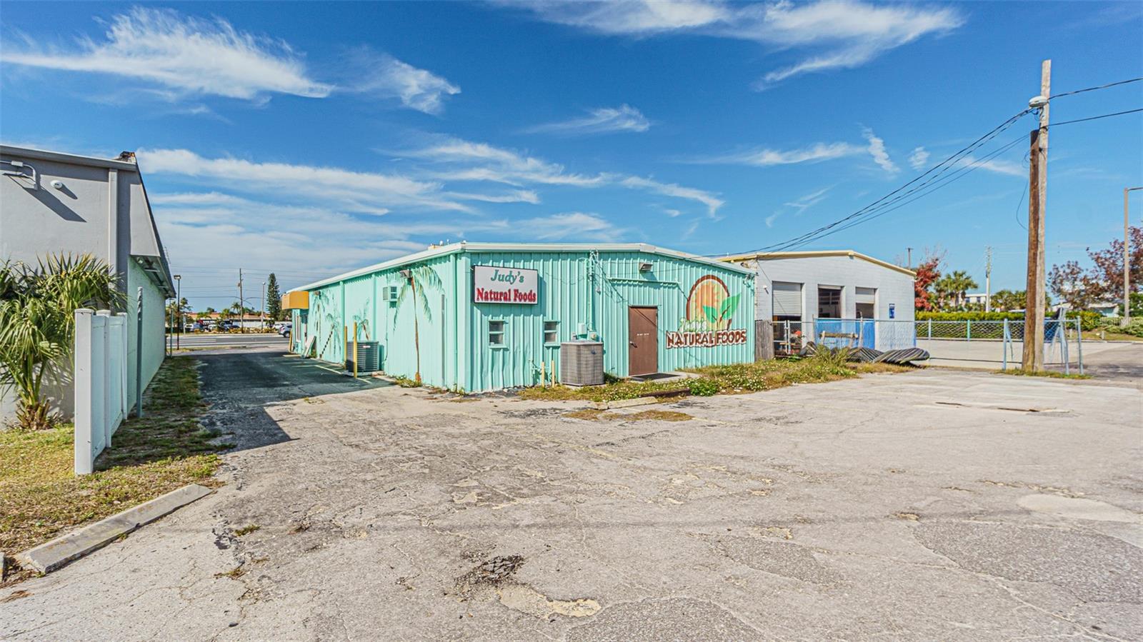TAMPA- TARPON SPRINGS LAND COMPANY - Commercial Lease