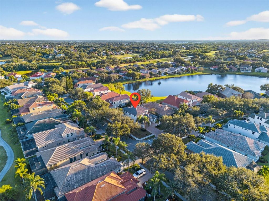 Photo of 9997 Sago Point Drive, Seminole, FL 33777 (MLS # TB8447908)