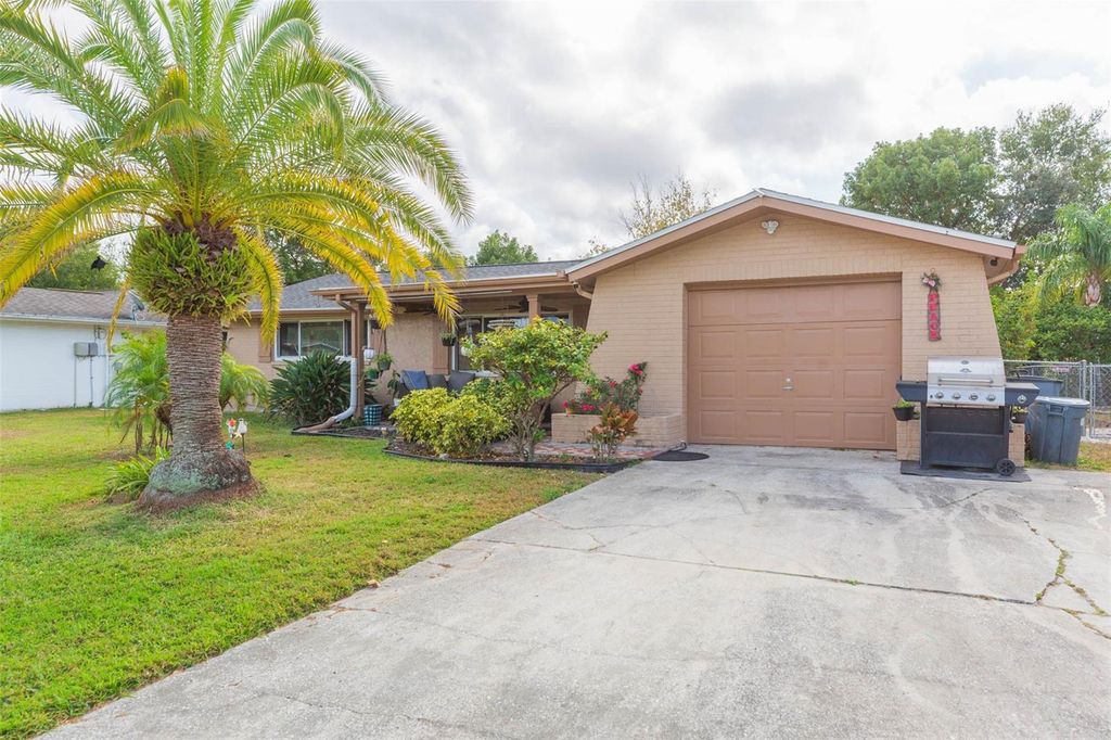 Photo of 7906 Cherrytree Lane, New Port Richey, FL 34653 (MLS # TB8460063)