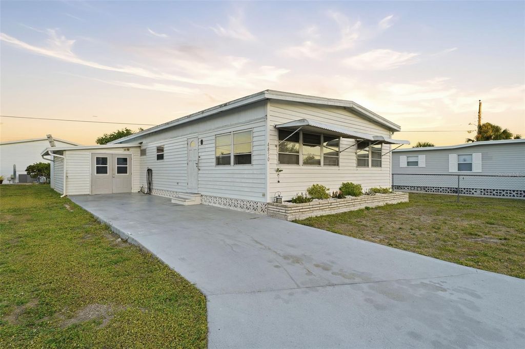 Photo of 4850 Brae Burn Avenue, Sarasota, FL 34234 (MLS # A4677166)