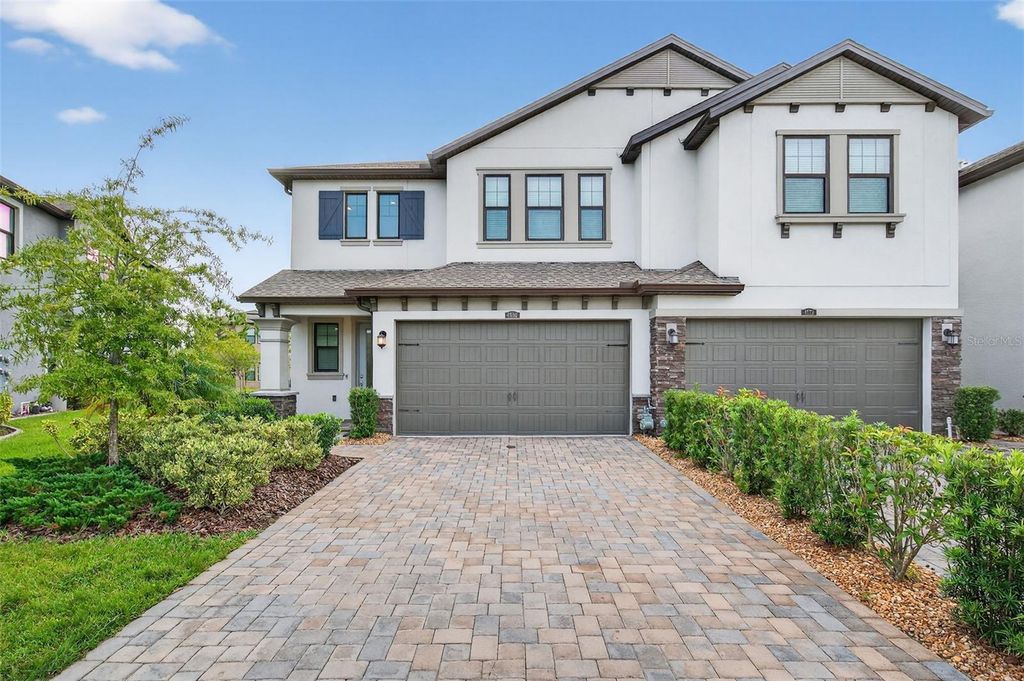 Photo of 4580 Almada Lane, Wesley Chapel, FL 33543 (MLS # TB8439434)
