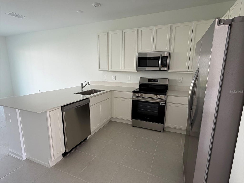Photo of 5820 Energy Way, Clermont, FL 34714 (MLS # O6452314)