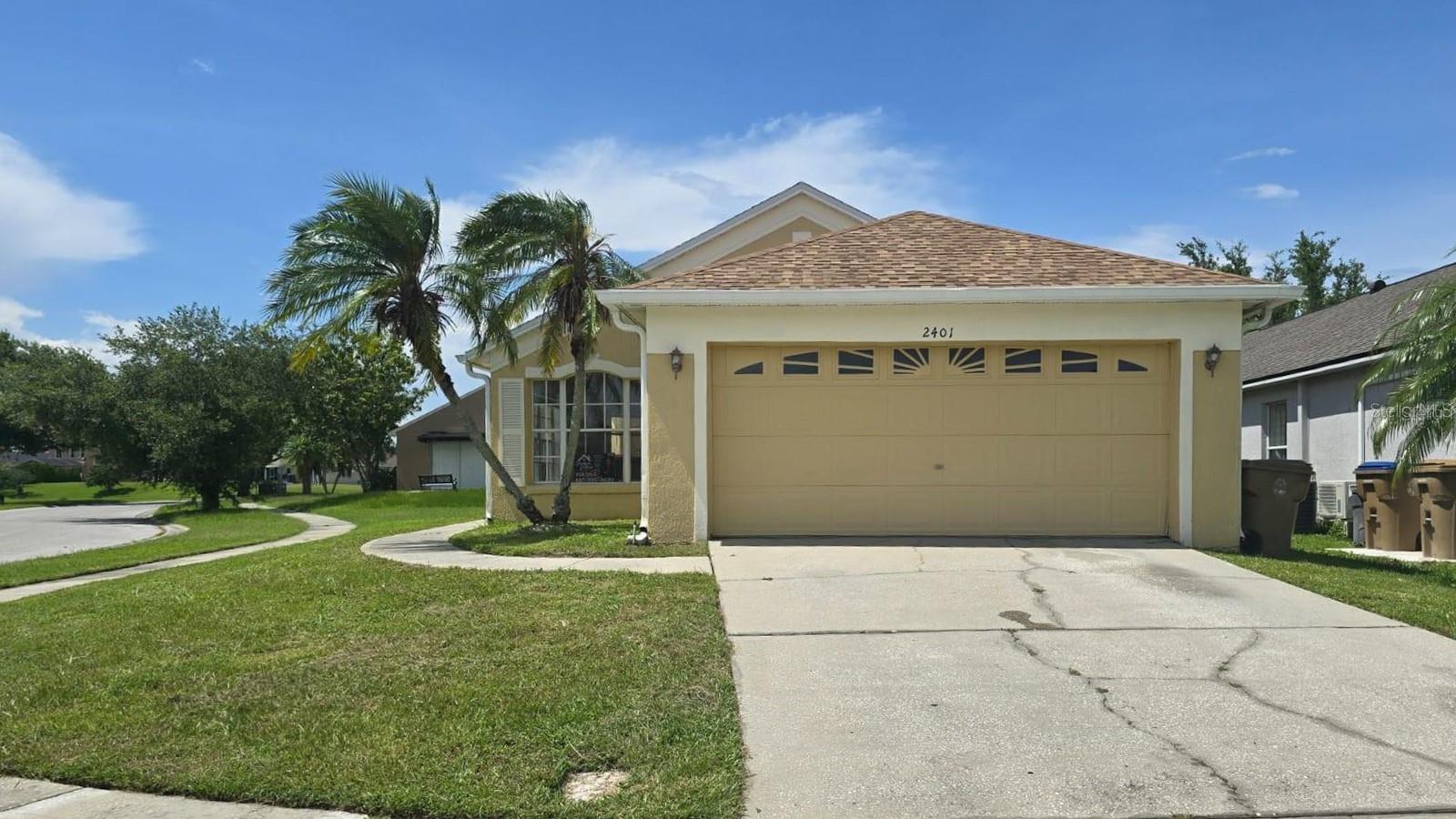Welcome to this 3-bedroom, 2-bathroom single-family home on a desirable corner lot in the gated Remington Community in Kissimmee. This split floorplan offers privacy, with the primary suite on one side and two additional bedrooms on the other. Enjoy easy maintenance with tile flooring throughout—no carpet. The centrally located kitchen provides convenient access to all living areas. The spacious living room opens to the backyard through sliding glass doors, offering serene lake views just across the street. Recent updates include a new roof in 2024. Enjoy resort-style amenities including a golf course, community pool, tennis courts, park, and playground.