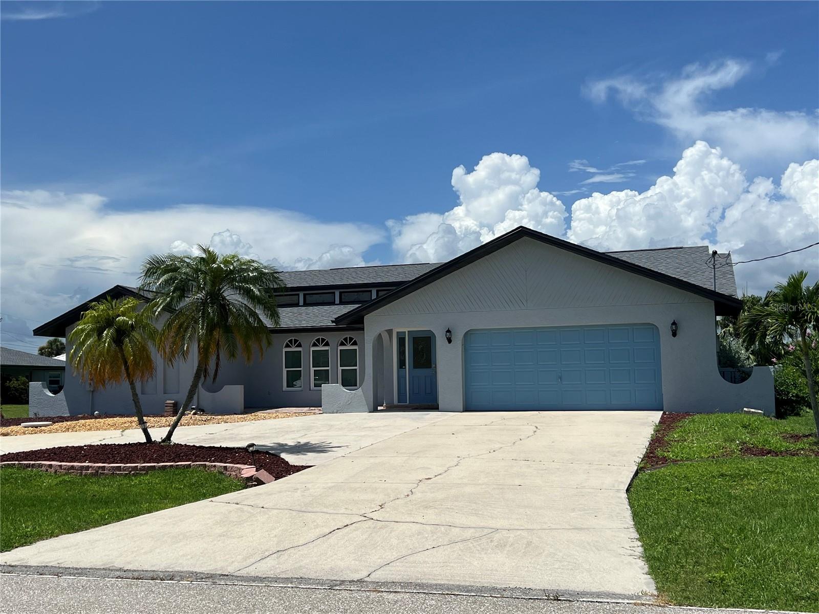 Captivate your senses and embrace the serene lifestyle at 5405 David Blvd, Port Charlotte, FL 33981, where comfort meets elegance in this stunning fully furnished 3-bedroom home. Spanning a generous 1,700 sq ft, this inviting residence is designed to offer a seamless blend of style and functionality. The spacious open floor plan encourages gatherings and memorable moments, while the tastefully furnished interiors promise a vacation-ready experience. Two full bathrooms provide ample convenience and modern amenities, ensuring that every family member enjoys their own private retreat. Nestled in the heart of Port Charlotte, this property offers easy access to local attractions, dining, and shopping, making it a perfect home base for both relaxation and adventure. The well-appointed kitchen is a culinary enthusiast's dream, featuring all the essentials you need to create and savor delicious meals. Large windows throughout the home bathe each room in natural light, creating a warm and inviting ambiance. The peaceful neighborhood setting enhances the sense of tranquility, offering a perfect sanctuary away from the hustle and bustle. Relax under the stars in the warm embrace of the heated pool, or bring your boat along to embark on adventures in the vast Gulf of Mexico. Seasonal rent (December - April) $6,000 monthly. Weekly season rate $1,575. Off season rate (May - November) $3,000 monthly. Weekly off season rate $750. Utilitiies included on the monthly rate up to $150 monthly. Tourist tax of 12% is in addition to the rent.