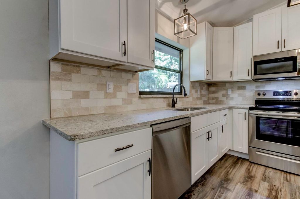 Photo of 1431 Noell Boulevard, Palm Harbor, FL 34683 (MLS # TB8454582)