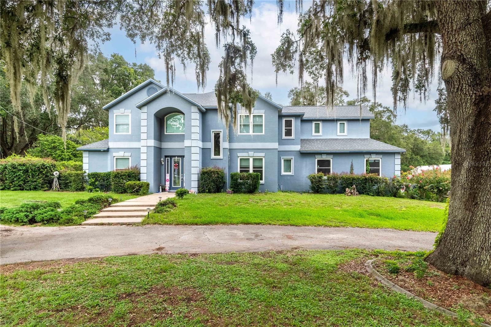 Bring your family, pets, and all your toys to this Gracious custom 2 story pool home, featuring 6 bedrooms, 3 full baths, 2 half baths, a 3 car garage, basketball court, and so much more, on a private fenced 2.5 acre estate shaded by immense oak trees that dot the property, all residing on a dead end street. Primary bedroom suite is on the first floor, along with a formal dining room, living room, office (or bedroom) as well as a large dine in kitchen, while the remaining bedrooms are upstairs, along with a bonus family room. Plenty of room on the property for gardens, possibly even livestock! No HOA - there is so much more to this property that you have to see to believe.
HVAC replaced in 2017, roof replaced in 2018, 24 windows replaced in 2022.