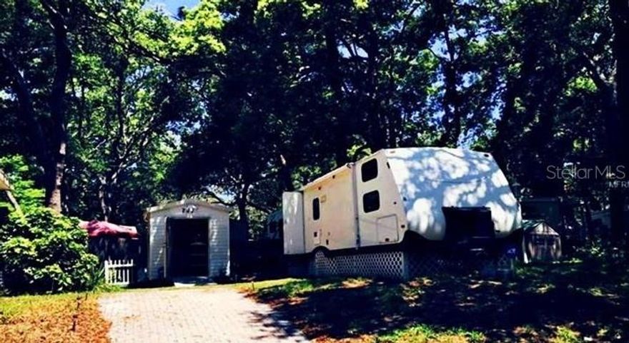 Cozy and efficient, this 1-bedroom, 1-bath manufactured home is located in the gated Clarcona Resort community, offering 310 sq ft of comfort with a practical, well-designed layout and a private 0.06-acre lot perfect for relaxing outdoors. Set in a clean, quiet, and secure area of Apopka, the property provides access to great amenities including a pool, clubhouse, and 24-hour gate security, while remaining close to major roads, shopping, and dining—ideal for anyone seeking affordable, low-maintenance living with a resort-style atmosphere.