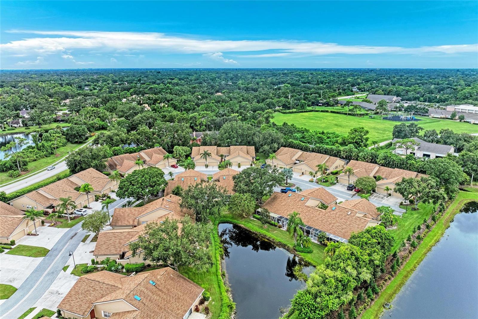 Magnificent completely updated 1,867SqFt under roof 2 bedrooms, versatile office/dan/guest room, 2 car garage villa, conveniently tucked away near the University Corridor, off the picturesque, winding road of Longwood Run. The Riviera Club is a pet-friendly, nicely landscaped community in a central location. Enter through the welcoming courtyard, perfect for your morning coffee completely upgraded with pavers and awning with decorative lighting for your enjoyment 5k$ upgrade! Featuring vaulted ceilings, fresh paint, new luxury vinyl flooring throughout i, No Carpet! And, new appliances! Brand New 2022 ROOF! Hurricane Resistant Windows and doors in 2023! NEW 2021 AC, NEW 2021 WATER HEATER Eat-In Kitchen is tastefully updated with high end granite countertops, matching backsplash, Grill out on your patio off of the very private brand new 2022 screened in with epoxy floors added 35k$ sunshine room! Spacious Master suite with Walk-in closet ! Large 2 car garage for storing bicycles, golf clubs—all of your toys! Lots of storage! Washer and Dryer included! This location offers everything at your fingertips: endless dining, shopping, UTC mall, Benderson Park, SRQ airport, short drive to downtown Sarasota & beaches, easily access I75. The nearby Longwood Park Community Center is here for you to enjoy tennis courts, pickleball, basketball area, playgrounds, grilling area, and community entertainment! And, nearby LA Fitness with huge pool, spa, sauna! Enjoy maintenance-free living with a low condo fee. No CDD. Super clean & move-in ready. Schedule your private showing today and enjoy this piece of Florida Paradise!