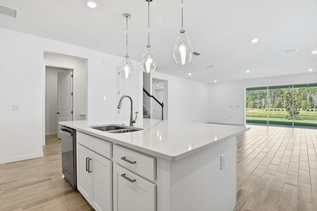 Photo of 597 Moon Shell Circle, New Smyrna Beach, FL 32168 (MLS # O6363268)