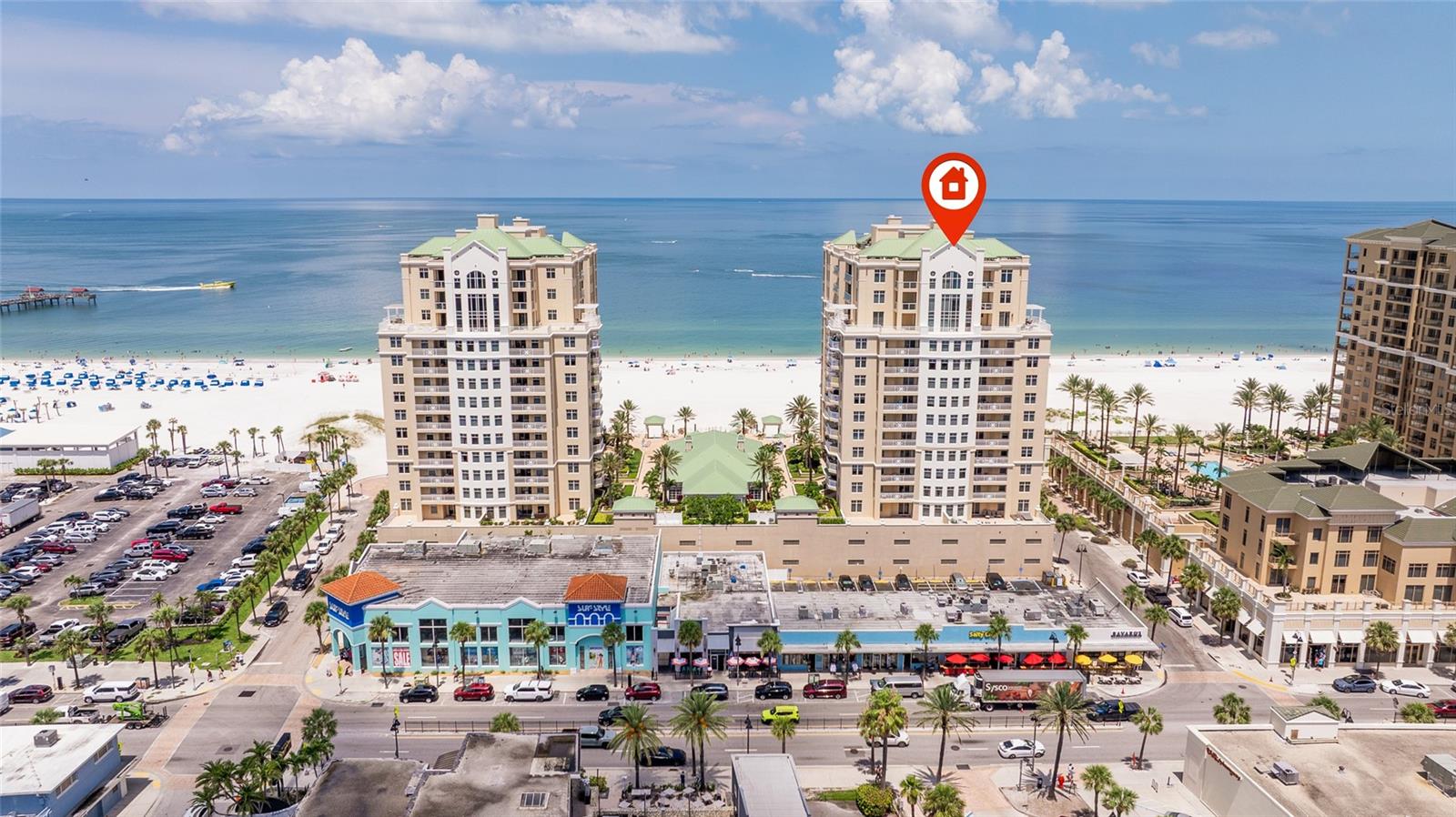 Sleek sophistication meets panoramic perfection in this rarely offered Siboney floor plan, located in the prestigious San Marco Tower at Mandalay Beach Club. Soak in UNOBSTRUCTED WATERFRONT VIEWS from nearly every room of this 3-bedroom, 2-bath residence, perfectly positioned with coveted southern exposure.
No detail was overlooked in the custom upgrades that elevate this condo far beyond the ordinary. The chef’s kitchen dazzles with natural quartz countertops featuring dramatic 3.5” mitered waterfall edges, high-end Samsung induction range with double oven, and custom cerused White Oak shelving with LED accent lighting. Wide-plank Duchateau European White Oak flooring—imported from Holland—flows throughout the living space, adding warmth and elegance. A thoughtfully designed murphy bed transforms the den into a fully functional third bedroom, offering versatility for guests or work-from-home needs.
Step onto the expansive wraparound terrace to enjoy sunsets over the Gulf or twinkling lights across Clearwater Bay. This residence also includes assigned under-building parking, a private storage closet, and the peace of mind of 24-hour security. Unit offers amazing rental income potential (30 day minimum) with proven performance and comes FULLY FURNISHED and turnkey—ready for immediate enjoyment or investment.
Mandalay Beach Club offers resort-style amenities including a beachfront pool and spa, state-of-the-art fitness center, clubhouse, and direct beach access. Units with views like this are truly rare—don’t miss your chance to live the ultimate beach lifestyle in the heart of Clearwater Beach.