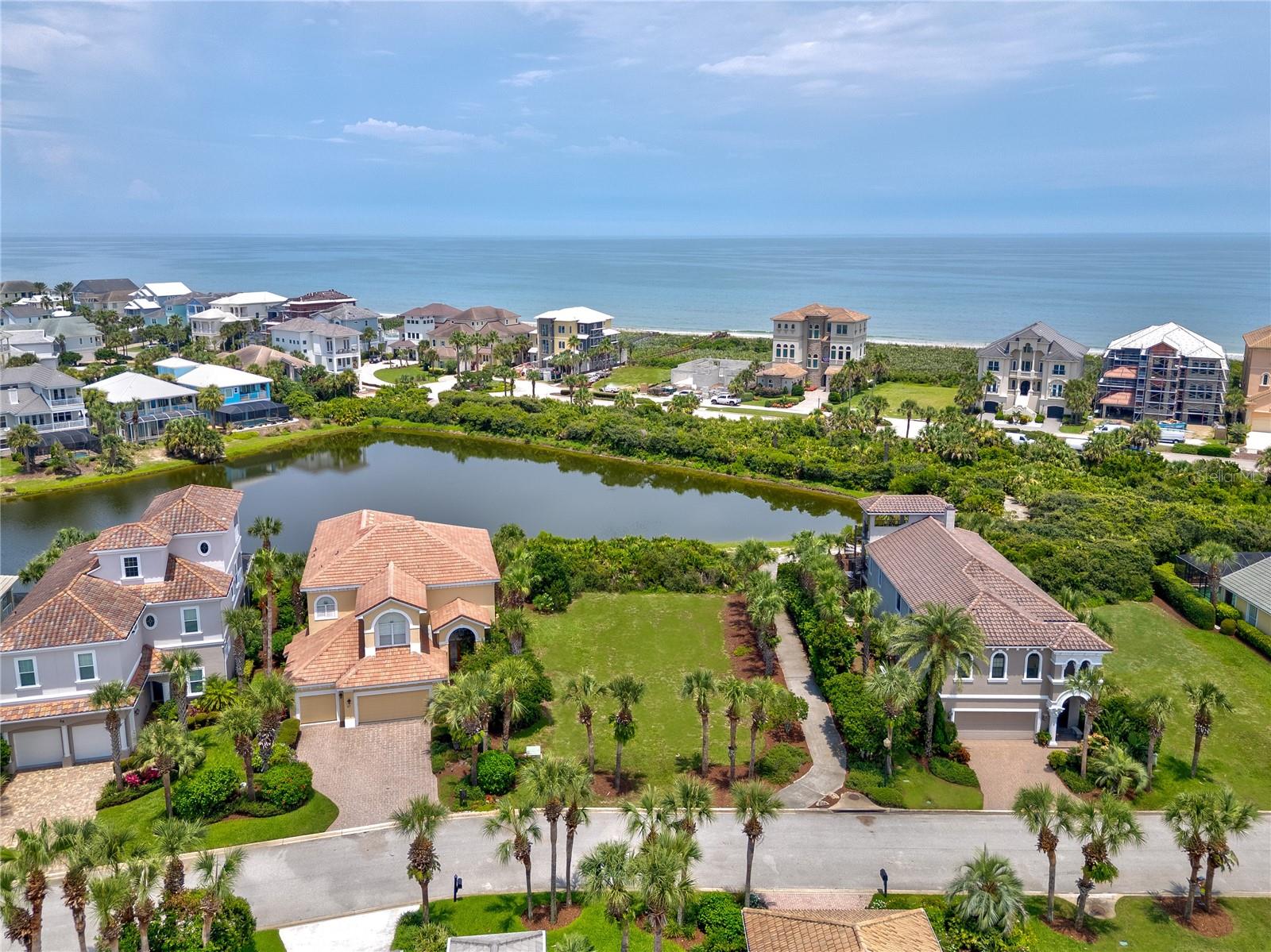 Feel the ocean breezes from your future Dream Home Site with stunning lake views, easy access to the beach access, and situated in the gated community of Ocean Hammock. No timeline to build your custom home that is located just a short walk from the beach on a quiet cul-de-sac street. You also have the opportunity to join the nearby Hammock Beach Club for access to world-class amenities. See this spectacular home site just steps from the beach today!