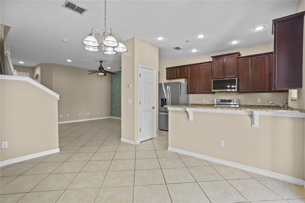 Photo of 9450 Silver Buttonwood Street, Orlando, FL 32832 (MLS # O6350344)