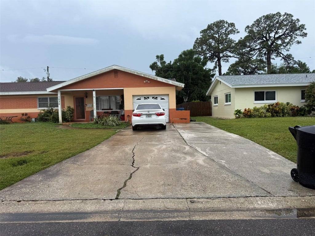 Photo of 1030 S 64th Avenue S, St Petersburg, FL 33705 (MLS # TB8560081)