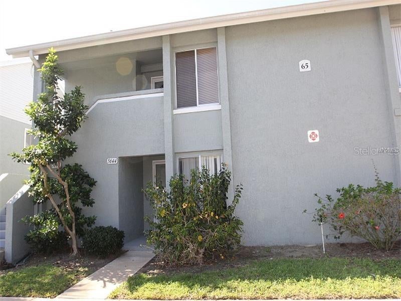 Photo of 5644 Blue Shadows Court #65-2, Orlando, FL 32811 (MLS # O6445576)