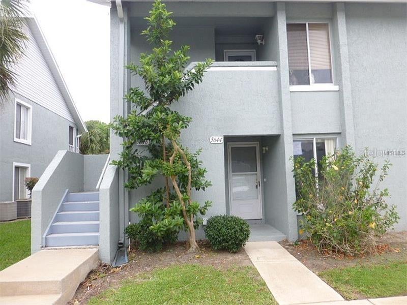 Photo of 5644 Blue Shadows Court #65-2, Orlando, FL 32811 (MLS # O6445576)