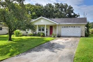 This spacious south Lakeland home is located in an established community with NO HOA, conveniently located just south of the Polk Parkway, making commutes to Tampa or Winter Haven a breeze. This 3/2/2 ranch style home is situated on a generous sized lot, noticeable upon arrival to the residence. SMILE! You're going to love the peace of mind of the smart home security camera (stays with the home!) Once inside, you will note tile flooring throughout. The kitchen has stainless appliances, quartz countertops, breakfast bar, and a window with a view! Generous sized living room great for gathering with friends & family. Bedrooms are well proportioned. Guest bathroom is ADA compliant. Laundry is in the garage. A large climate controlled shed present for your storage needs or quiet get aways for outdoor chores, minus the heat! Plenty of outdoor space will provide enough space for gardening, exercising the dog, or simply enjoying fresh air. Added features are double paned windows, a newer water heater (2024), and HVAC & all ductwork replaced 2017. Recent roof inspection revealed intact and secure roof. Septic was replaced 2013 and drain field 2017. Schedule a tour today!