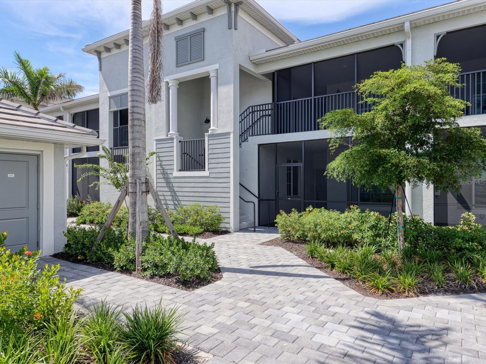 Be the first to step into luxury and call this ideally located, first floor unit home. With unobstructed views of a landscaped courtyard and direct access to your detached 1-car garage steps away from your door you will ease right into Wellen Park living. 2 Bedrooms plus a private den with french doors, perfect for an office, guest overflow, or media room! Fabulous kitchen with quartz countertops, shaker-style cabinetry, stainless steel appliances, large pantry, and oversized island fit the lux-lifestyle. Open-concept living and dining with rear lanai views of palm trees and adjacent golf tees. A walk-in, built-in, and linen closet in primary suite with en-suite bath. The best part..... Two Covered Lanais to sit and enjoy the the beauty and sounds of Florida. Walking or golf-cart access to Wellen Park’s resort-style amenitiesÂ
Residents enjoy access to: 18-hole Championship Golf Course, Laguna Pool & Tiki Bar plus satellite Pools , Pickleball, Tennis, Dog Park and miles of walking trails. Enjoy a Guard-Gated community with golf-cart-friendly access to dining, weekly music events, farmer’s markets, and beach attractions. HOA includes cable, internet, water/sewer, trash, landscaping, and building maintenance. Tenant pays electricity + contents insurance and and transfer fees for golf. Minimum annual food/beverage spend required upon Tiki Bar and clubhouse openings ($500–$750/year)
