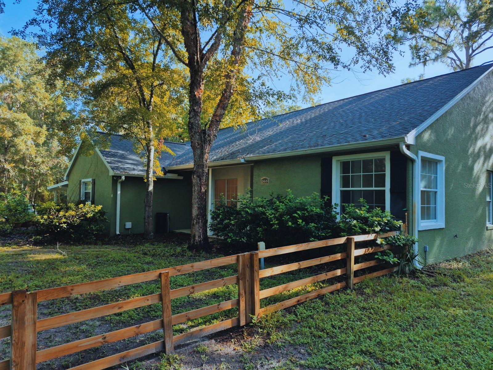 Manatees, Cool Springs, Fishing, Boating, Swimming & All Florida Nature are within minutes of this open spacious home on a beautiful 1 1/4 acre corner lot graced with mature oak trees and surrounded by peace and quiet. Additionally the home sits high and dry with NO flood insurance needed! Yet, it's only seconds from the Withlacoochee River, just north of Crystal River and all its natural Florida water wonderland! Only five minutes from Tampa General Hospital at Crystal River and any kind of shopping needs only minutes away yet peaceful, private and serene when you pull in your driveway. Coming through the door, you will love the wide open floor plan when you see the great room, wood burning fireplace, dining area off to the side and spacious kitchen with stainless appliances. Off to one side is the master suite with double sinks, a garden tub, a walk in shower and a walk in closet. Additionally, there's a bonus room off the side of the master bedroom for your "ME" space. Across the house, find the guest bath, with an accessible walk in shower and two more bedrooms. Adding to the space is a huge office/den/workshop/game room (your choice!) off the side of the kitchen. It opens to the over-sized covered 2 car parking area. Furthermore, the home boasts energy efficient double pane windows throughout! Worrying about storms doesn't happen here since there's a whole house automatic emergency generator that runs on LP gas and starts immediately if power goes out. So no matter what happens with the weather, you still have all your lights, ac and appliances! Whenever company is coming, there's a circular drive offering lots of extra parking. A side drive goes off the main and goes up to a 20 X 20 work shop on a slab with electricity. There is an amazing swim spa that lets you swim up stream continuously so you don't have to keep turning around or flipping. You will love the peaceful ambiance of this property! The roof was new in April of 2025! This home is ready for you to make it your own. Come and see if it works for you! But don't wait or someone else will claim it first!