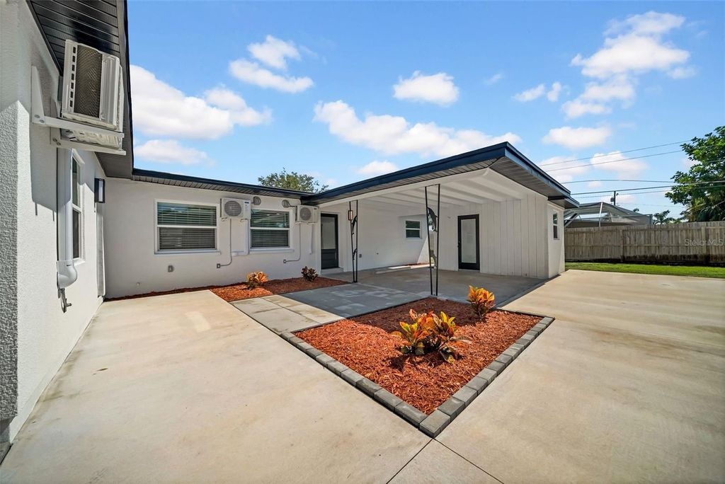Photo of 6855 Gulf Winds Drive, St Pete Beach, FL 33706 (MLS # TB8506839)
