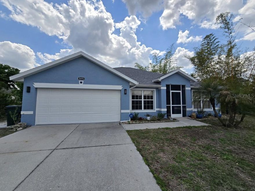 This well maintained home is move-in ready in North Port Estates. Some of it's many upgrades features include: new luxury vinyl flooring, new roof (2023), and newer A/C system, whole-home reverse osmosis (RO) system, delivering clean purified water throughout the home. The bright inviting layout has abundant natural light & an open-concept design ideal for both everyday living and entertaining. Kitchen features amply cabinetry and workspace, seemlessly connecting to the dining and living areas. Spacious bedrooms. Primary suite offers large dual sink granite counter, remodeled walk in shower, along with two walk in closets. Step outside to a huge screened in lanai with convenient dog door, fully fenced backyard, perfect for pets, play or entertaining.  The property includes a separate shed for storage or chicken coop, offering unique opportunities for hobby farming or a more self-sufficient lifestyle. 
Backyard is lined with fruit and exotic trees. The Owner has been nominated for "Greenest Citizen Award" in North Port.
If you are looking for a beautiful home and peaceful environment  - This Is The Home For You!