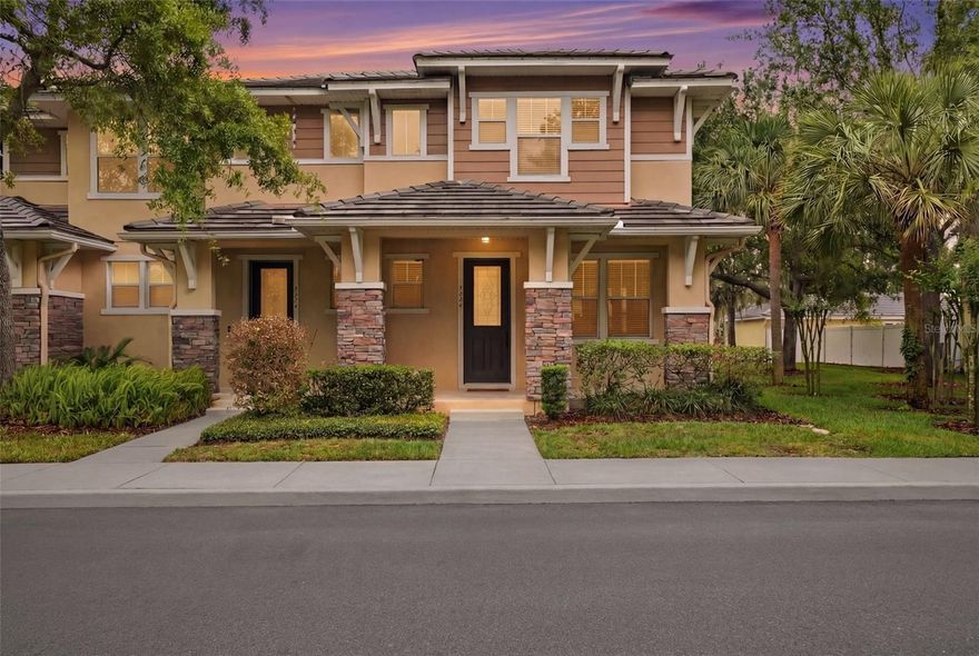 A rare find in townhome living in the exclusive Lake Burden community of Windermere — this pristine corner unit sits tucked at the edge of the community, offering exceptional privacy and natural light, with views of beautiful and well-kept gardens. 

Enjoy morning coffee on the beautiful front porch before stepping inside to soaring ceilings and hardwood floors. The well-appointed kitchen features granite countertops, an island breakfast bar, and stainless steel appliances. The open living and dining area offers a built-in electric fireplace and flows out to a private stone paver patio and rear-entry 2-car garage. All bedrooms are upstairs.

Lake Burden offers a pool, clubhouse, tennis courts, walking trails, fishing dock, and more — all minutes from Disney, major highways, and the best of Orlando.