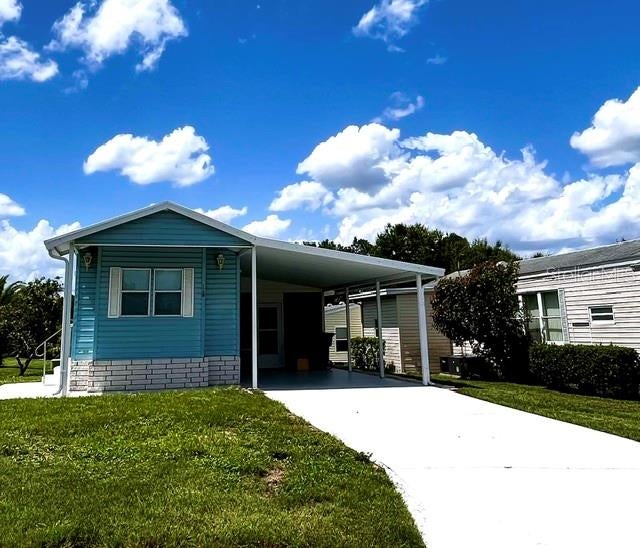 Photo of 50989 Highway 27 #128, Davenport, FL 33897 (MLS # S5158383)