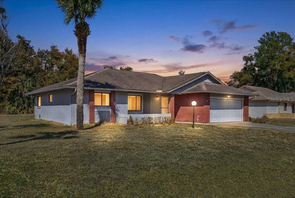 Photo of 50 Blairsville Drive, Palm Coast, FL 32137 (MLS # FC315985)